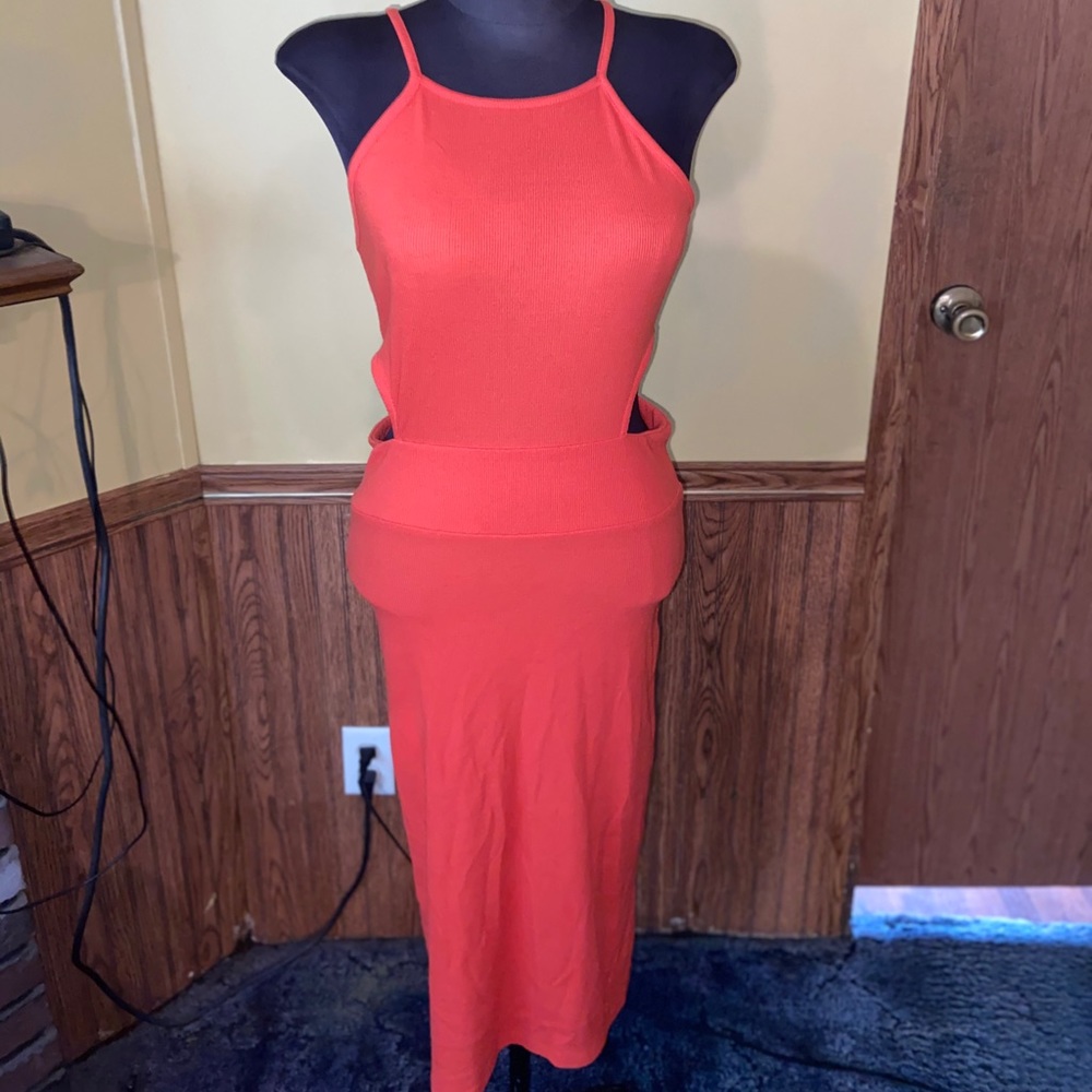 A orange ankle length dress